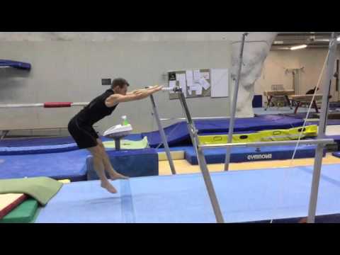 Kip on uneven bars (slow motion)
