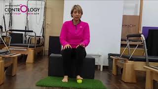 חיזוק והגמשת המפרק הראשון של כף הרגל עם כדור טניס