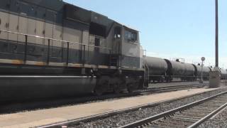 preview picture of video 'EB BNSF Train C-CAMSLP1-98A Yards Its Train In La Junta, CO with two Executive Painted SD70MACs'