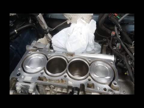 2014 Jeep Patriot 2WD Latitude 2.4 L Cylinder Head Gasket and Oil Pump Balance Shaft Replacement.