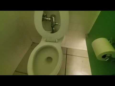 Rodeway Inn Lobby Men's Restroom Full Shoot