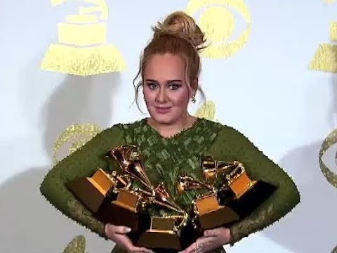 ADELE TURNS DOWN GREEN TO TEND TO HER GREENS!