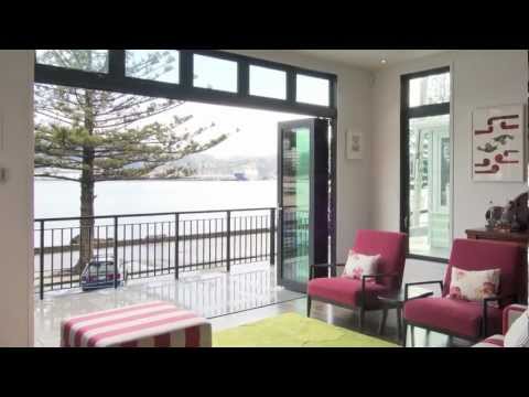 Traditional styled waterfront house located in Wellington accommodates open-plan living