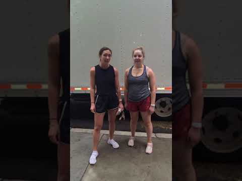 Customer reviewing the moving team