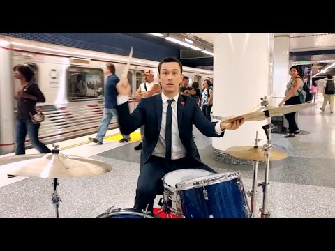Joseph Gordon-Levitt plays the drums in a subway
