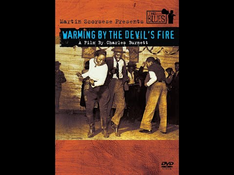 THE BLUES: WARMING BY THE DEVIL'S FIRE
