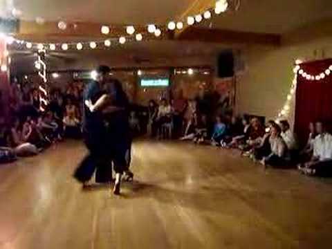  Luciana Valle  and  Alex Krebs  are  dancing  to  a  tango