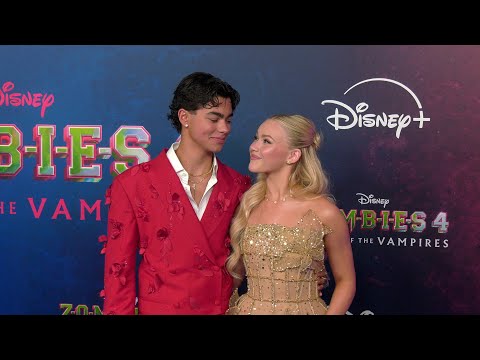 Malachi Barton and Freya Skye "Zombies 4: Dawn of the Vampires" Premiere Blue Carpet