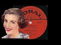 Manuello (His Head Is In The Shade) - Dorothy Collins