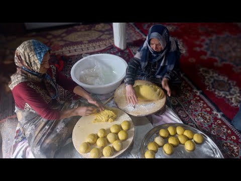 Cooking a local cake in the fire