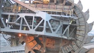 Largest earthmover in the world destroys a bulldozer