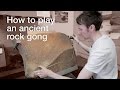 How to play an ancient rock gong