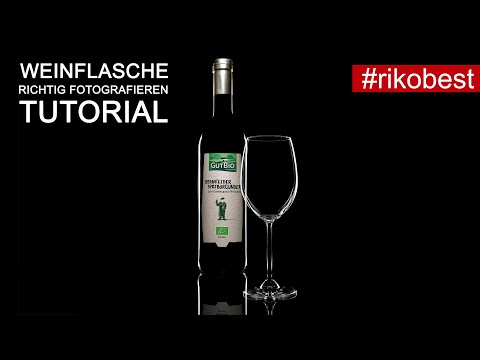 Glas professionell fotografieren - Weinflasche auf schwarzem Hintergrund mit nur einem Aufsteckblitz