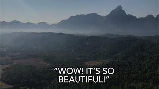 How did they get there?! Motorbike bolted to Mountain Peak - Vang Vieng