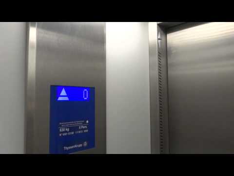 Crappy ThyssenKrupp Synergy MRL Traction elevator @ Railwaystation, Bruges, Belgium.