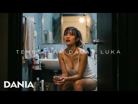 TENGGELAM DALAM LUKA — DANIA cover artwork