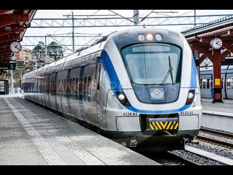Sweden, Stockholm. Farsta strand station — Älvsjö station. Pendeltåg. Train