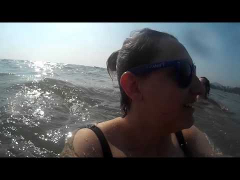 Couple playing in the Arabian sea in Patnem, South Goa, India