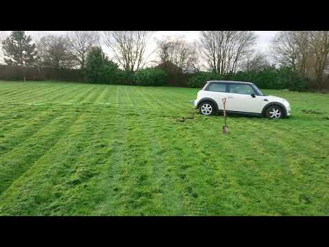 Land rover freelander 2 rescuing a stuck mini