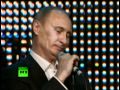 Russian prime minister Vladimir Putin sings ...