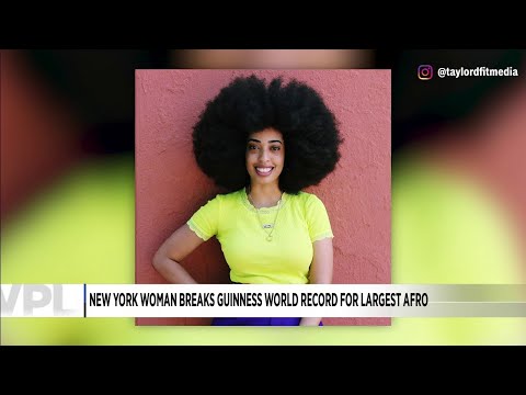 Woman breaks Guinness World Record for largest Afro