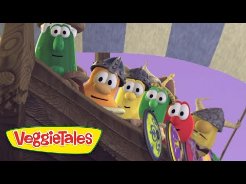 VeggieTales characters lean over the wooden ship railing, ready for adventure.