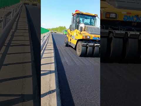 The asphalt road is built in one shape- Good tools and machinery make work easy