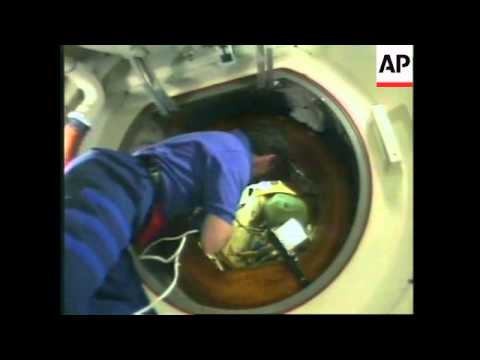 SPACE: SHUTTLE ATLANTIS DOCKS WITH MIR SPACE STATION UPDATE