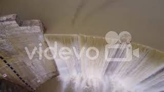 Beautiful aerial over a high waterfall or dam in full flood stage near Ojai California 池田直弘神戸 池田直弘