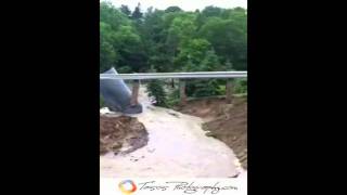 Download the video "Road / Bridge washed out in Luskville Quebec!"