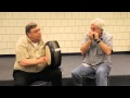 Playing the  Bodhran and Harmonica