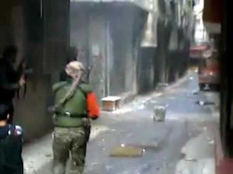 اشتباكات بين كتيبة صقور الجولان وقوات النظام في حي التضامن في مدينة دمشق