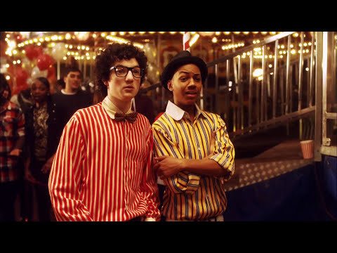 Degrassi Season 10 carnival promo still: cast with VV Brown performing 'Shark in the Water' under circus lights