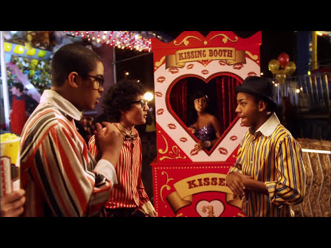 Wide shot from Degrassi’s Season 10 promo: carnival stage and crowd, signaling the Boiling Point tone