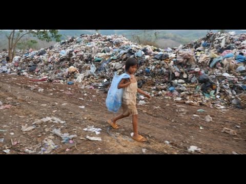 Poverty Kid Walking With Garbage Bag | Stock Footage - Videohive