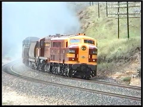 Australian diesel locomotives 4490 & 4520 hauling freight from Lithgow to Orange - November 1995.