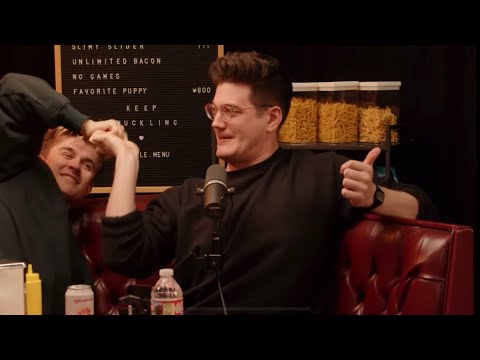 Ludwig "wins" a thumb war against Ted Nivison