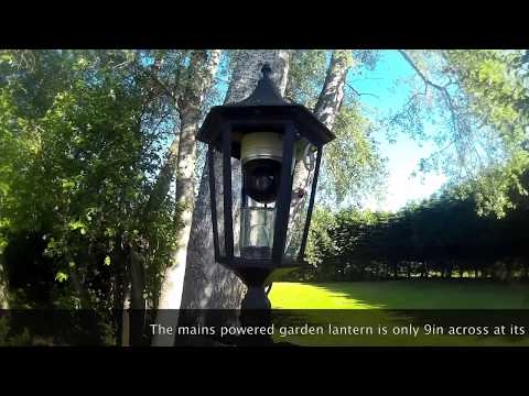 Поворотные IP-камеры Squeezing a Hikvision DS-2DE2204IW-DE3 PTZ camera inside a garden lantern