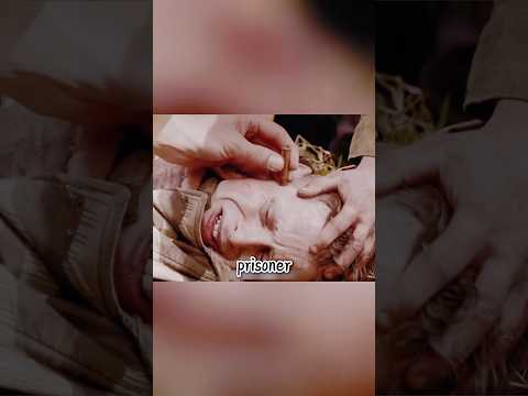 The Soviet soldiers placed a bullet on the head of a German prisoner and then hit it hard#movie