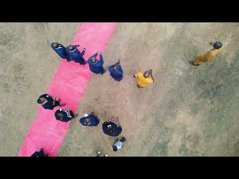 JOHN MBAKA AND JOHN KAY PERFOMANCE AT A BURIAL