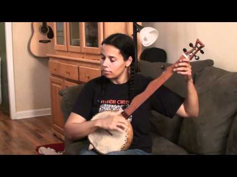 Rhiannon Giddens plays on her gourd banjo 