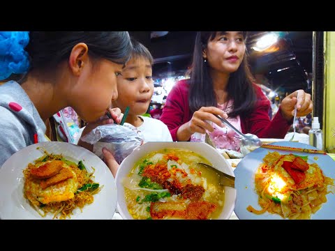 Porridge Pork Leg And Fish And Fried Noodle With Beef And Eggs For Breakfast