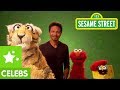 Sesame Street Benjamin Bratt And Elmo Translate For A Tiger