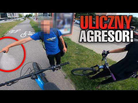 AGGRESSIVE PASSER-BY THREATENS WITH POLICE TEARS