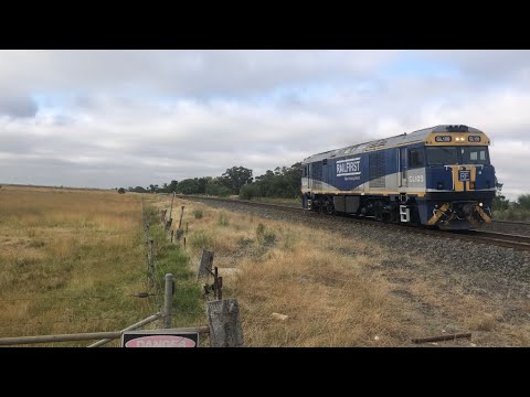 GL109 single loco passing Wallan crossing
