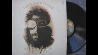 Holding-John Hartford