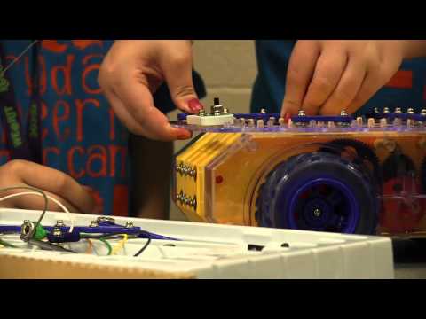 A frame from the embedded video, with a play button over the image.