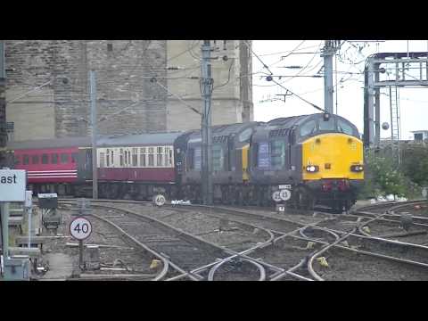 DRS 37607 and 37605 passing Newcastle