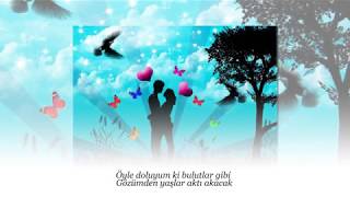 CAVİT TANÜREK  Öyle doluyum ki bulutlar gibi