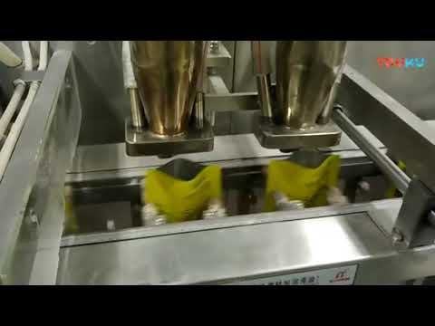 Automatic dual output premade pouch powder packaging machine